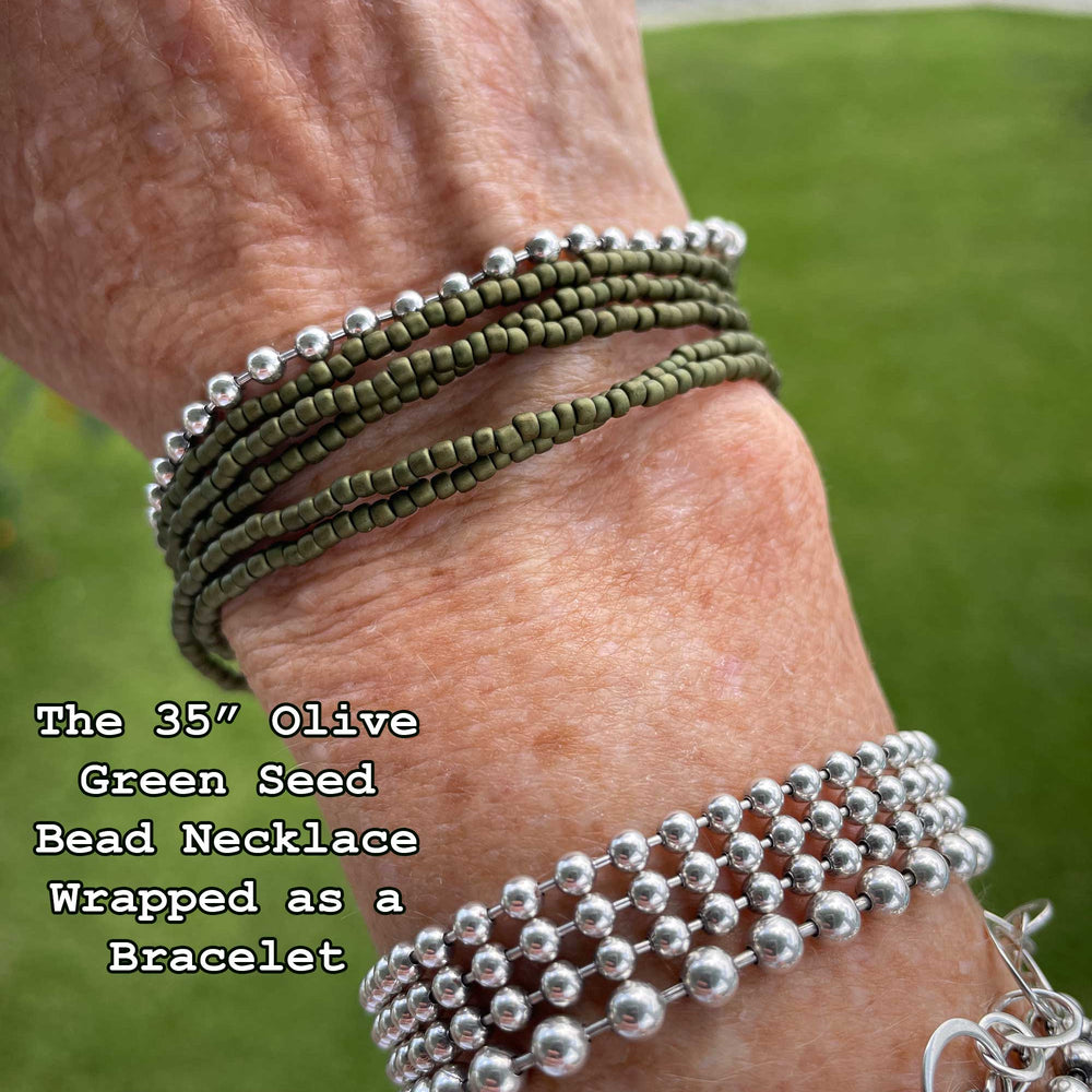 
                      
                        35" Olive green beaded bracelets on a wrist 
                      
                    