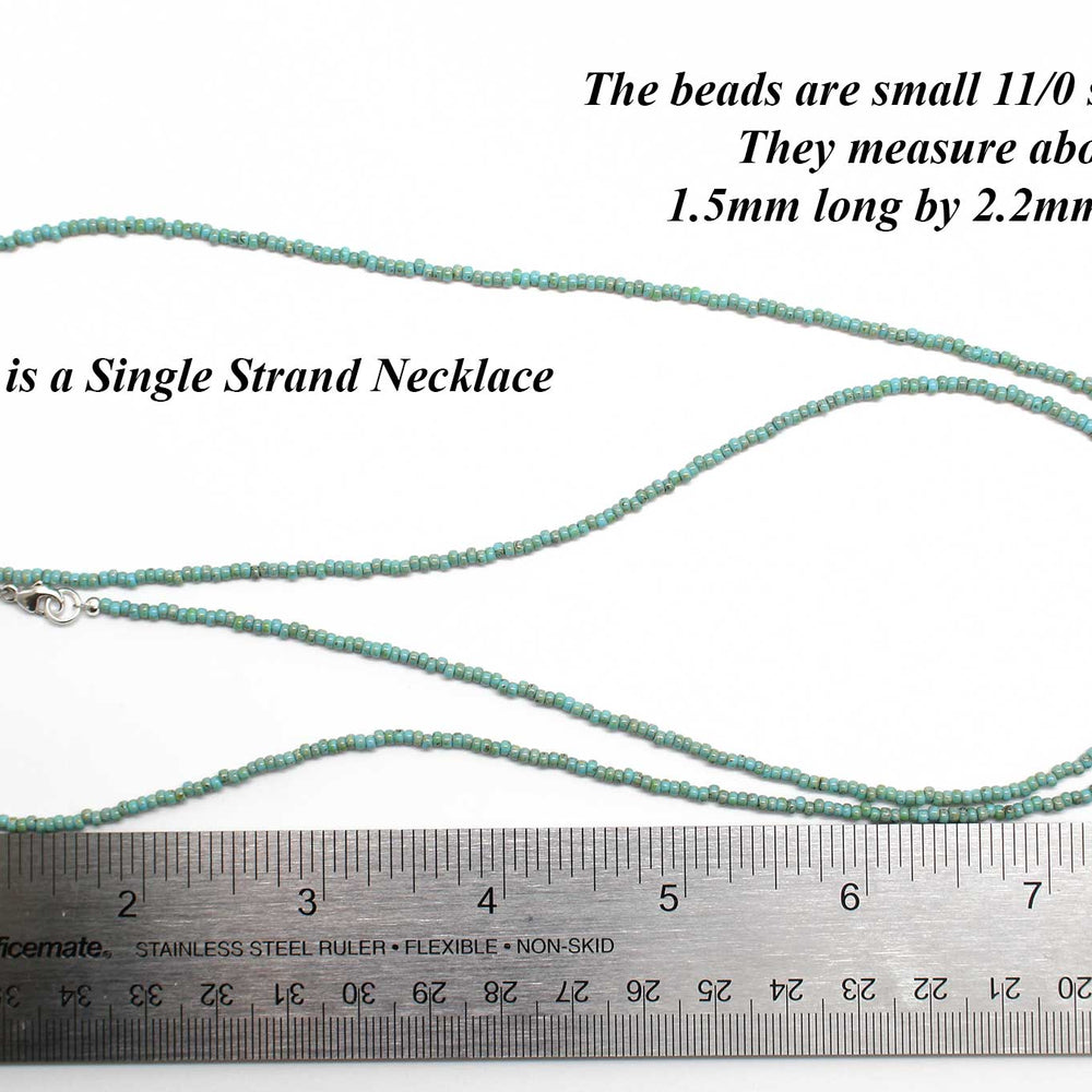 
                      
                        Turquoise Blue Picasso Seed Bead Necklace
                      
                    