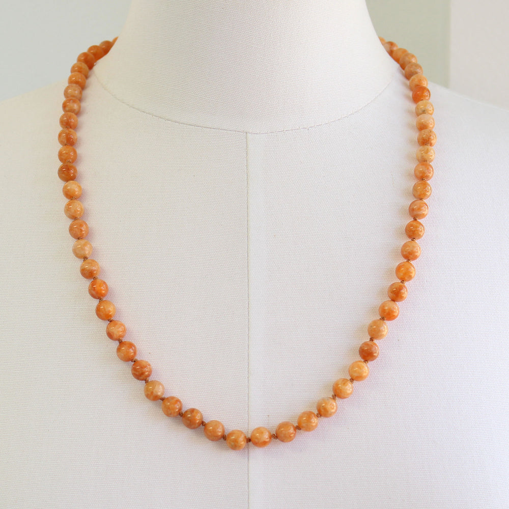 
                      
                        Orange Calcite Bead Necklace
                      
                    