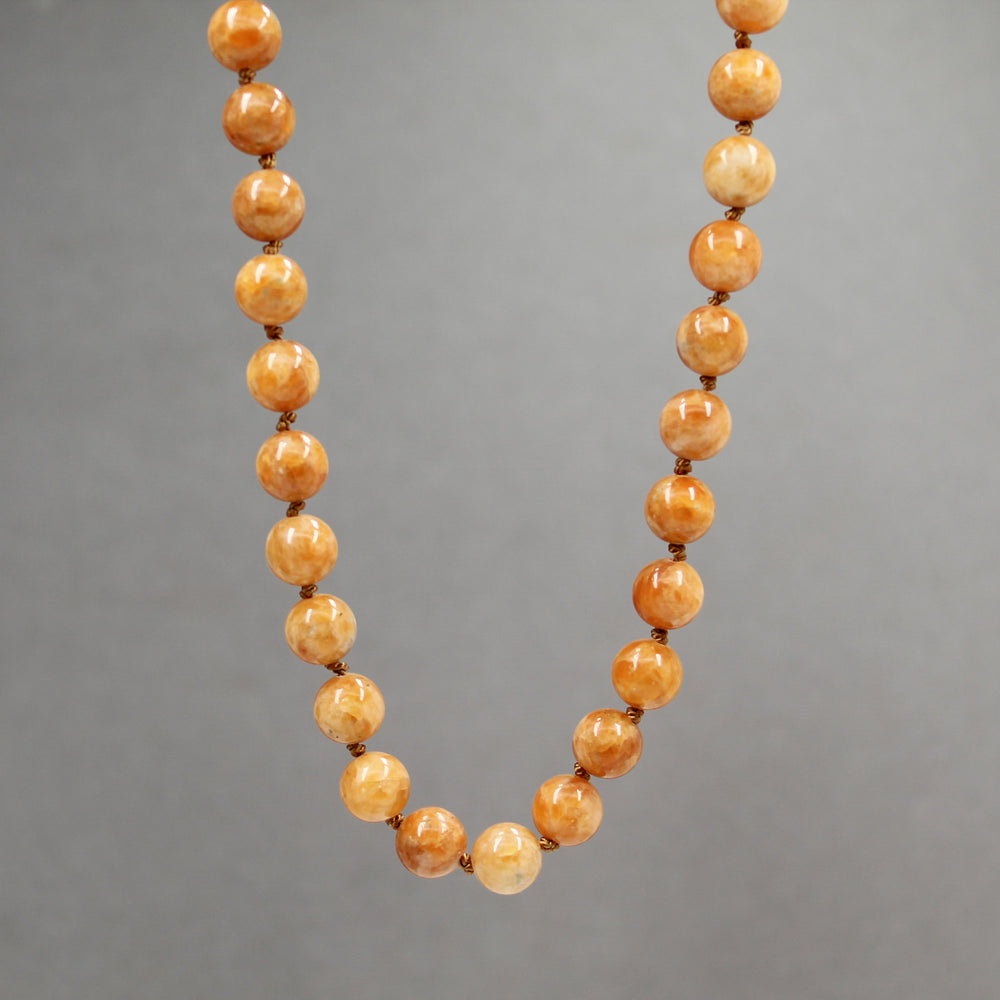 
                      
                        Orange Calcite Bead Necklace, Hand Knotted 26 Inch
                      
                    