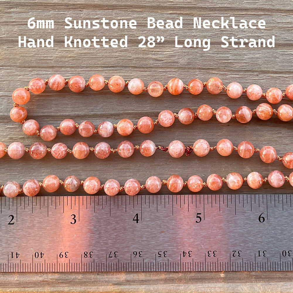 
                      
                        6mm Round Smooth Sunstone Bead Necklace, Hand Knotted 28 Inch
                      
                    