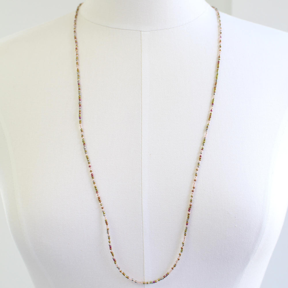 
                      
                        Long Pink Gold Seed Bead Necklace
                      
                    