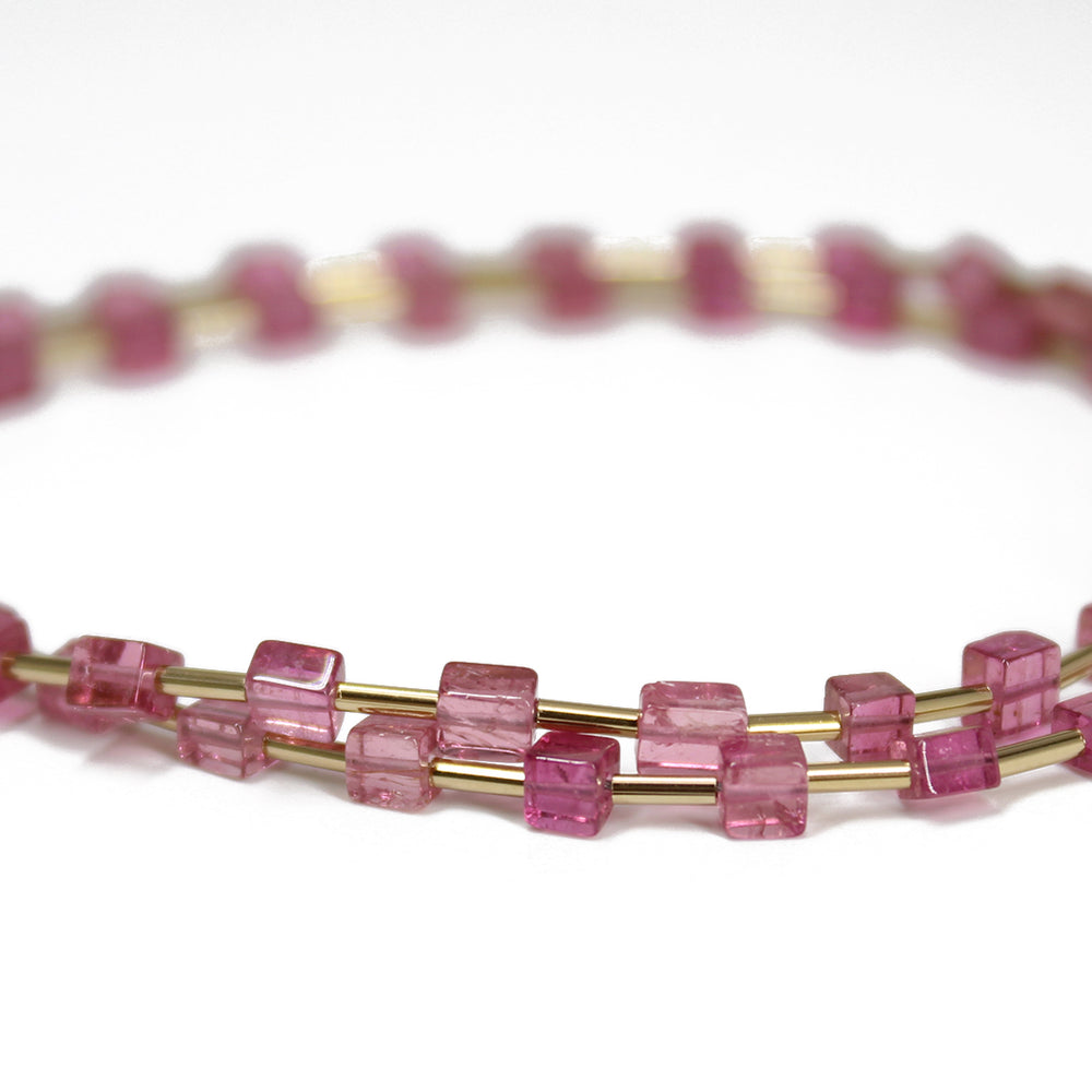 
                      
                        Pink Tourmaline Cube Bead Bracelet with Yellow Gold Filled Accents
                      
                    