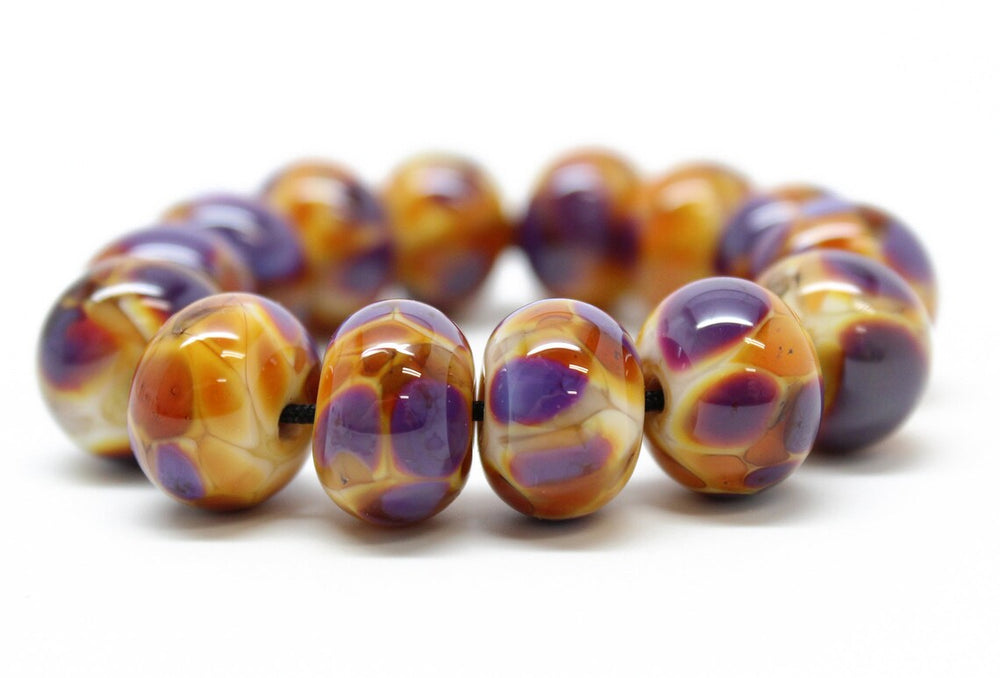 
                      
                        Purple and Gold Lampwork Beads
                      
                    