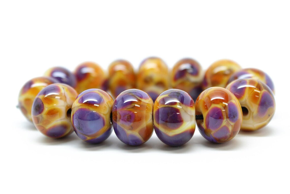 
                      
                        Purple and Gold Lampwork Beads
                      
                    