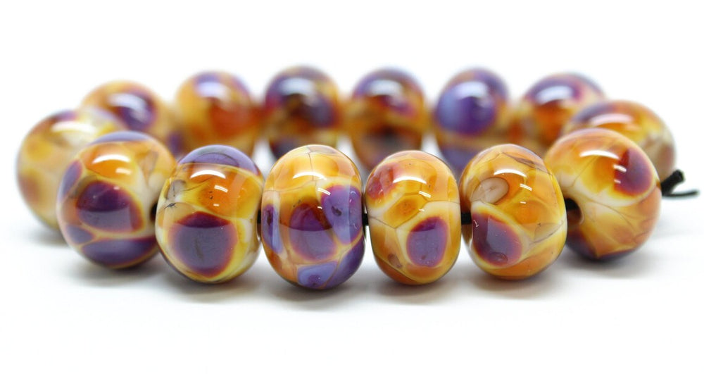 
                      
                        Purple and Gold Lampwork Beads
                      
                    