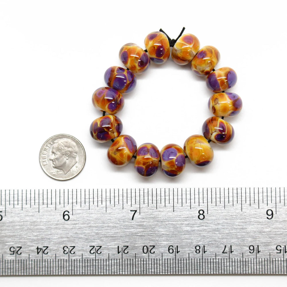 
                      
                        Purple and Gold Lampwork Beads
                      
                    