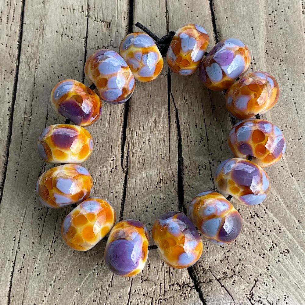 
                      
                        Purple and Gold Lampwork Beads
                      
                    
