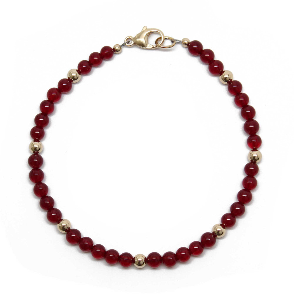 
                      
                        Red Jade and Gold Filled Bead Bracelet
                      
                    