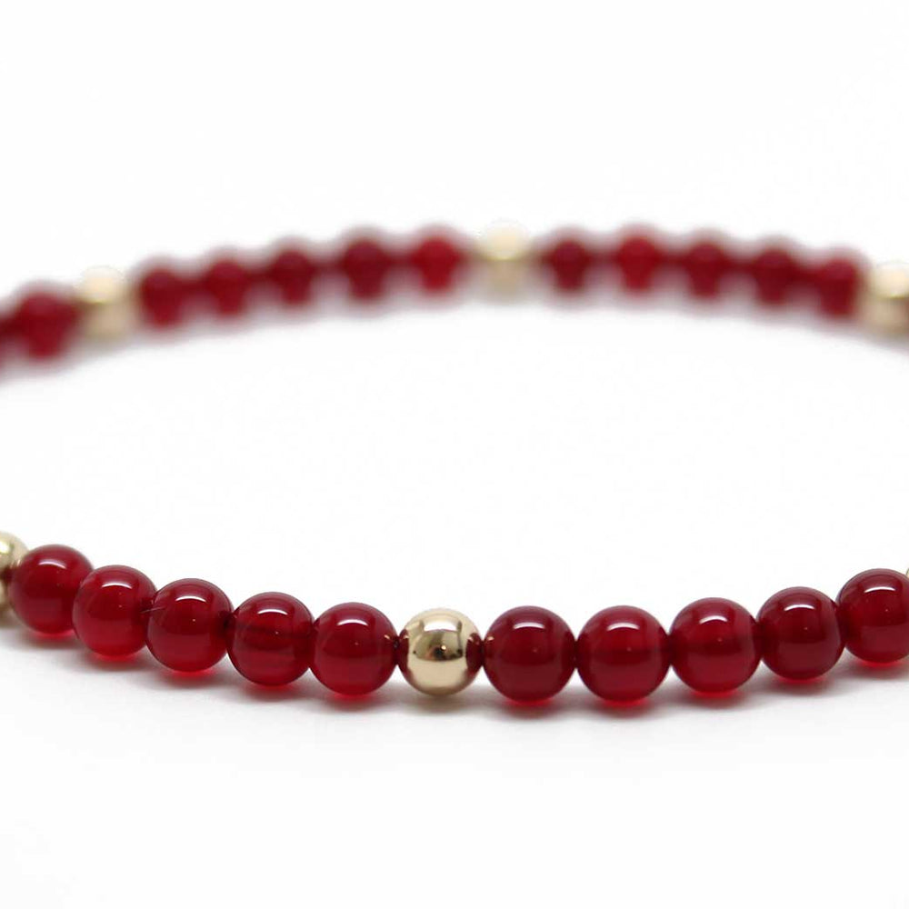 
                      
                        Red Jade and Gold Filled Bead Bracelet
                      
                    