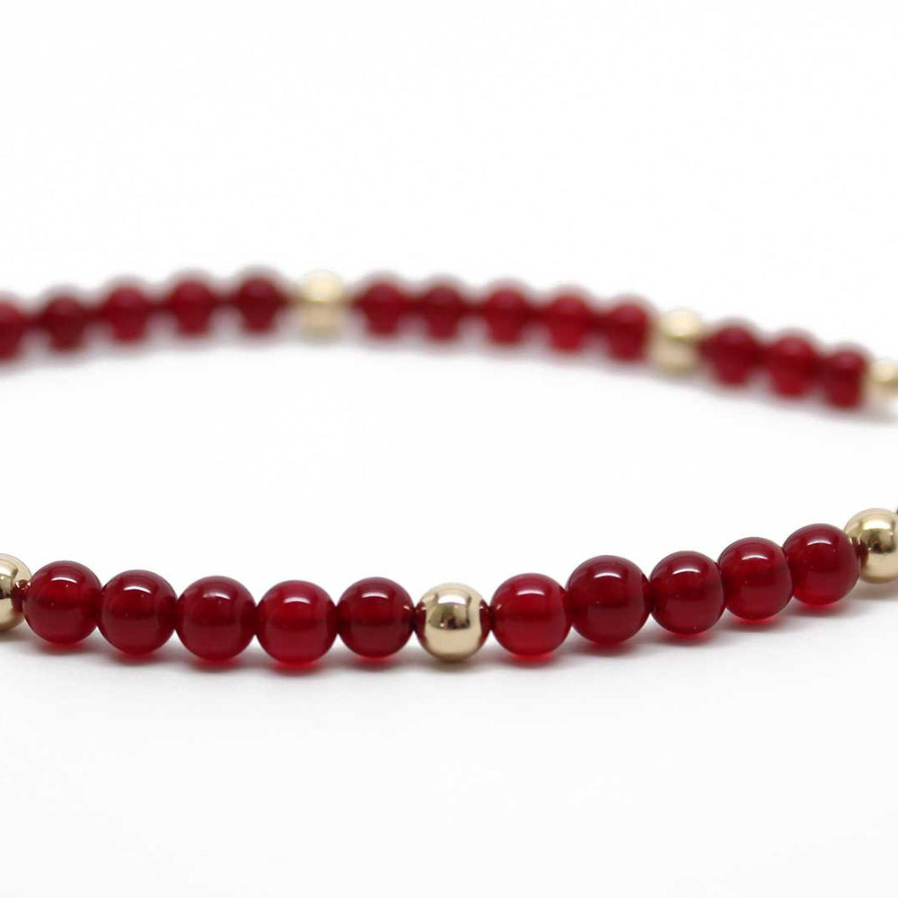 
                      
                        Red Jade and Gold Filled Bead Bracelet
                      
                    