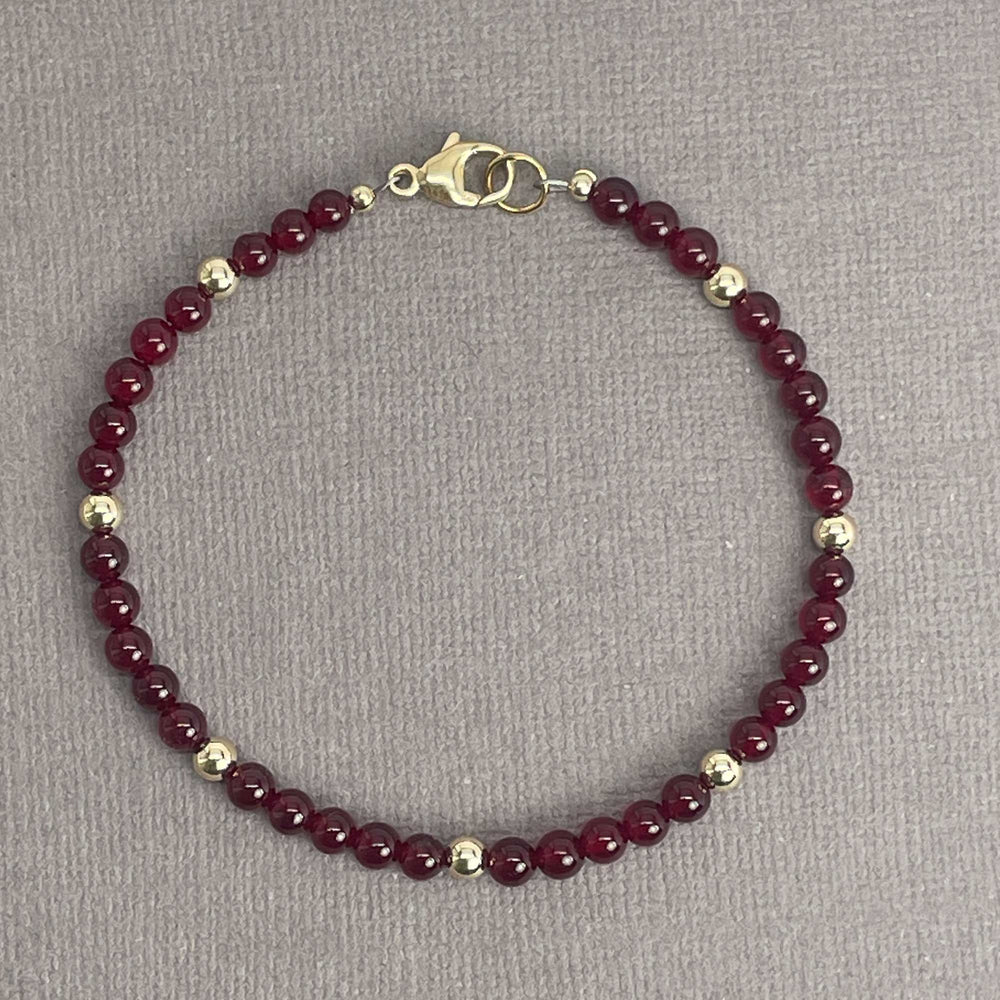 
                      
                        Red Jade and Gold Filled Bead Bracelet
                      
                    