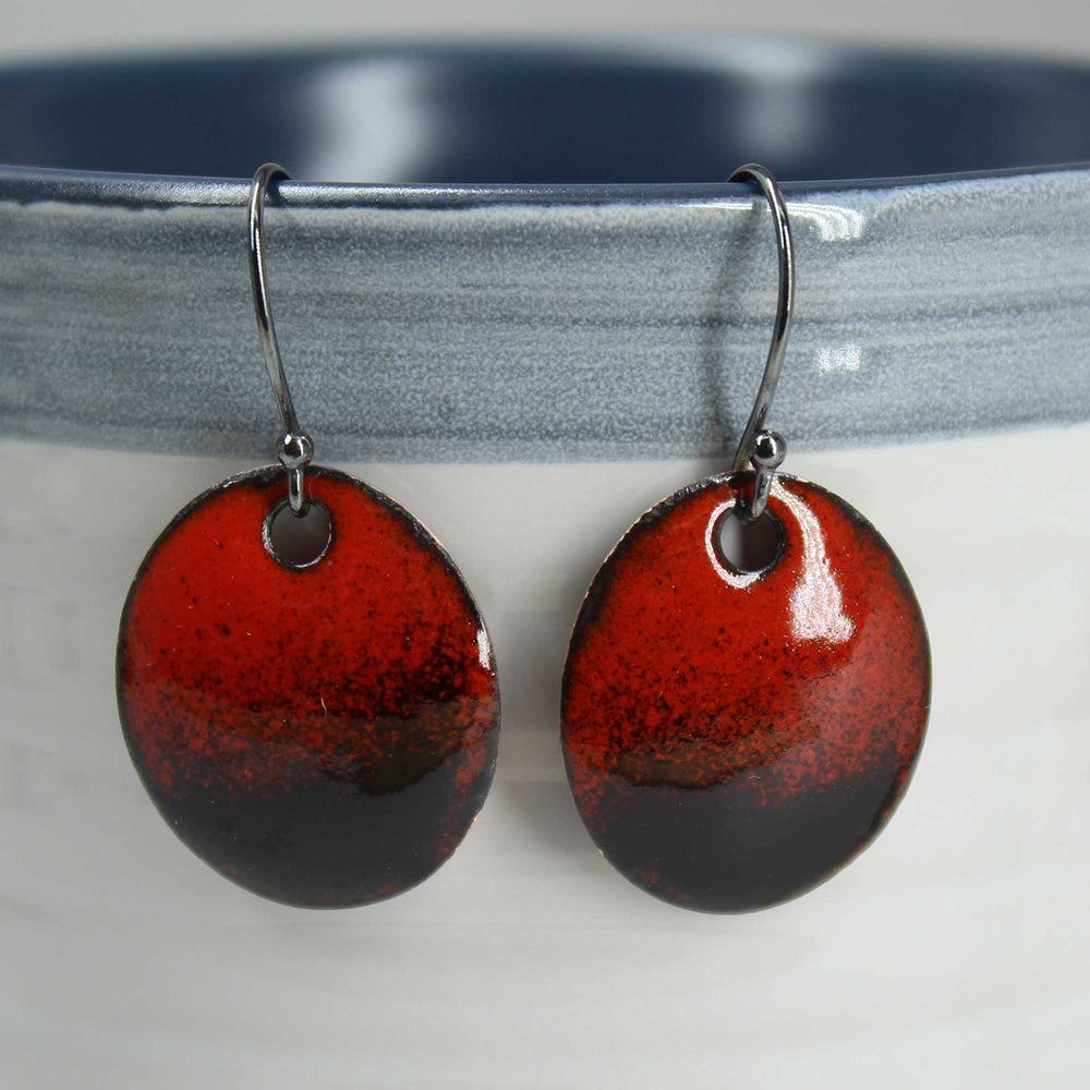 
                      
                        Red and Black Enamel Earrings
                      
                    