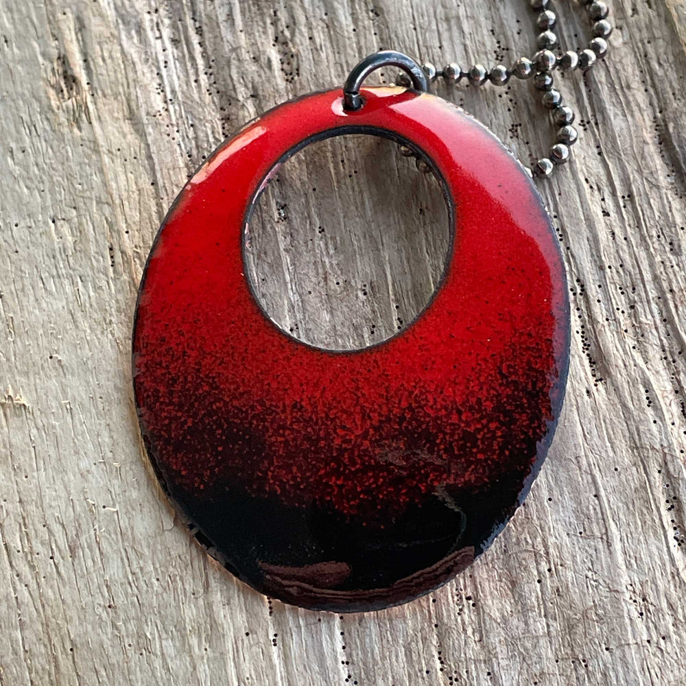 
                      
                        Red and Black Glass Enamel Oval Pendant Necklace
                      
                    