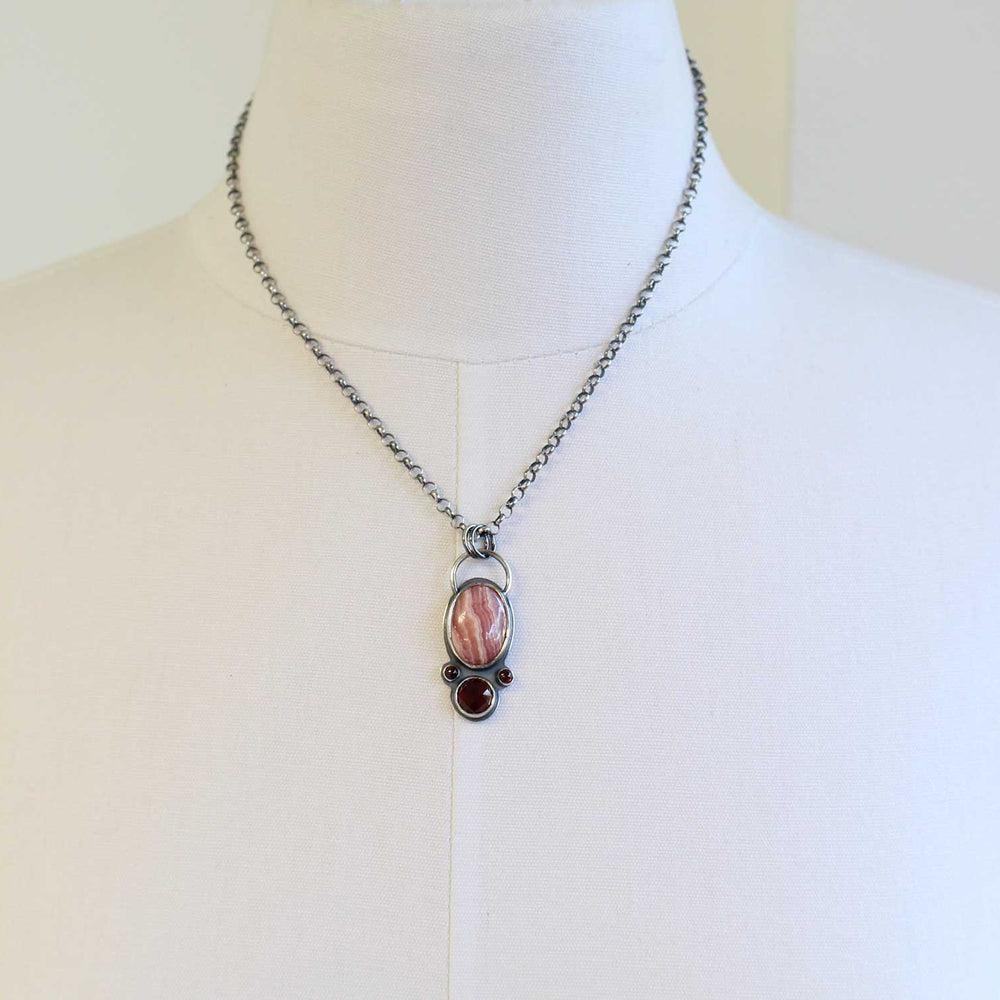 
                      
                        Rhodochrosite and Garnet Pendant Necklace
                      
                    