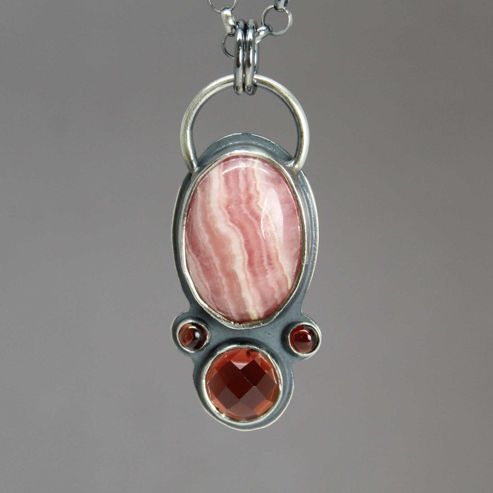 
                      
                        Rhodochrosite and Garnet Pendant Necklace
                      
                    