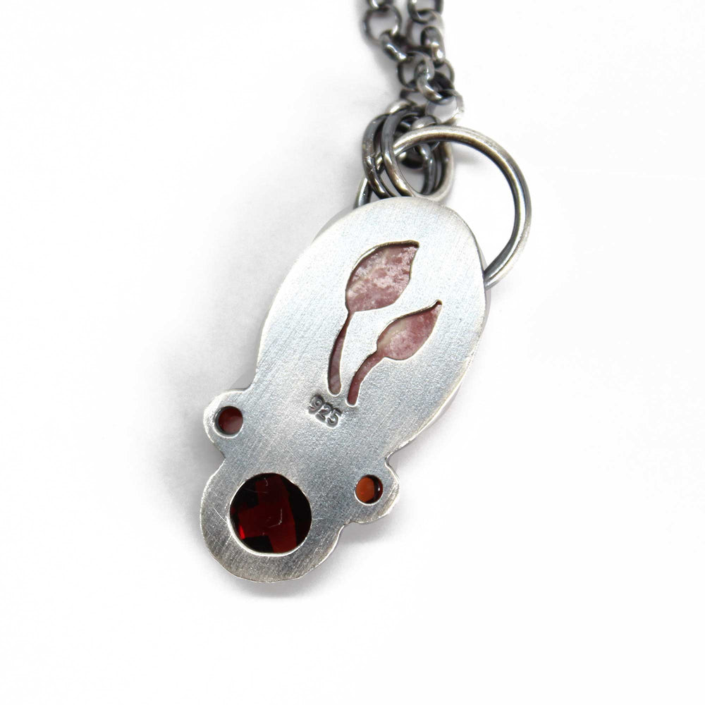 
                      
                        Rhodochrosite and Garnet Pendant Necklace
                      
                    