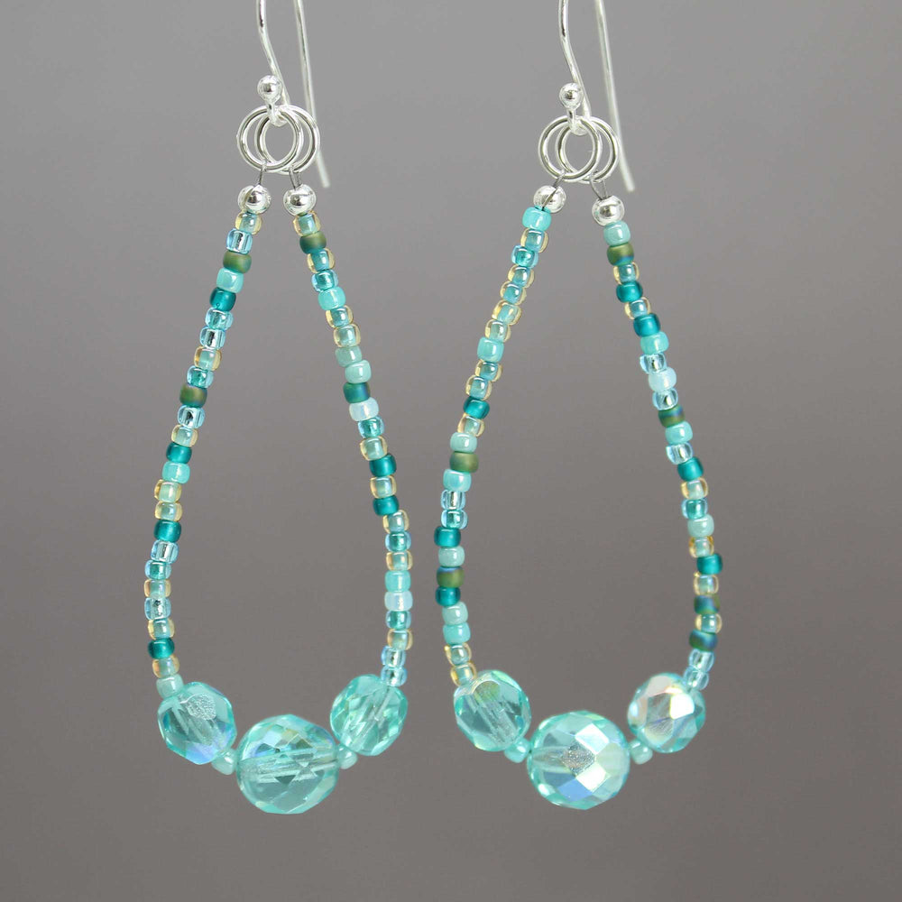 
                      
                        Blue Green Seed Bead Earrings with Czech Crystal Accents
                      
                    