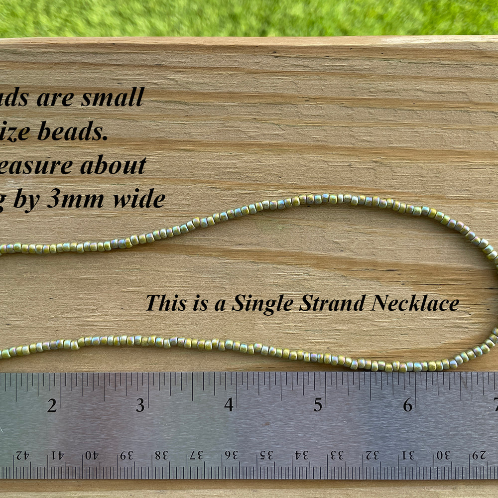 
                      
                        Semi Glazed Olive Green Seed Bead Necklace
                      
                    