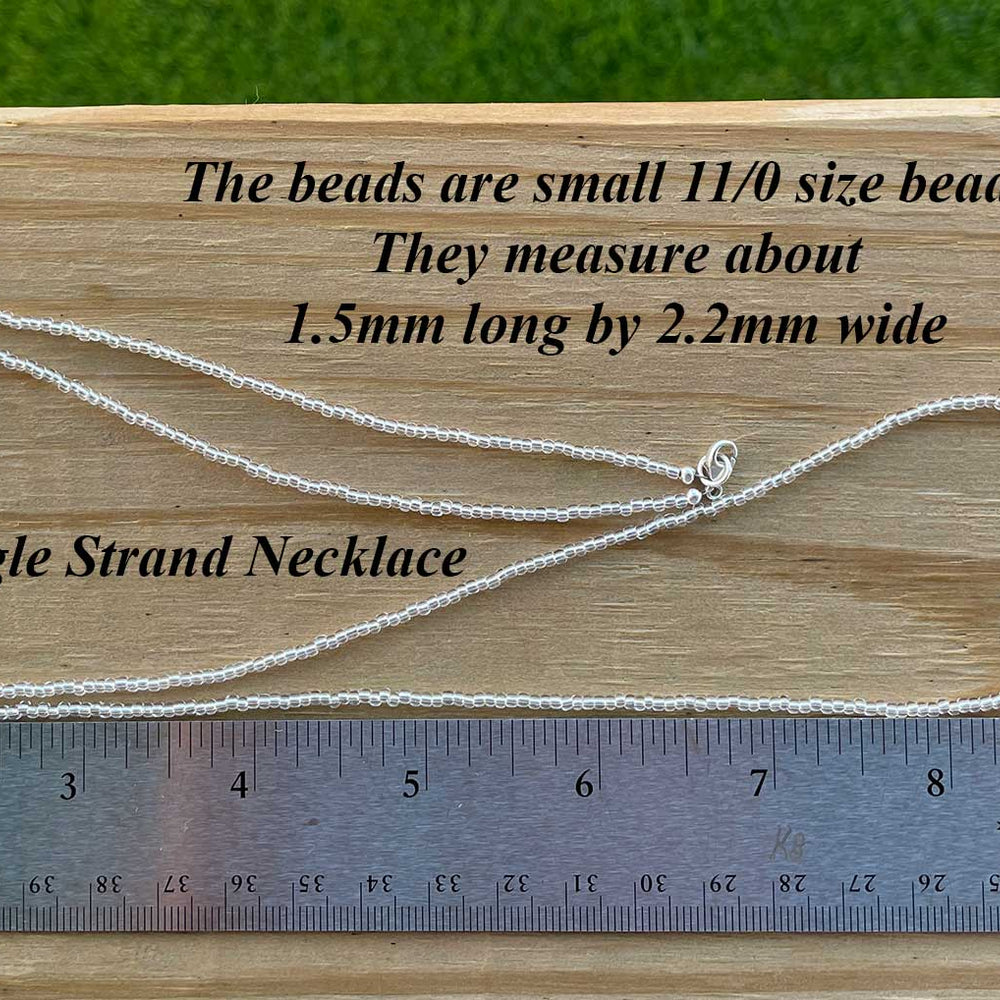 
                      
                        Silver Lined Crystal Seed Bead Necklace
                      
                    