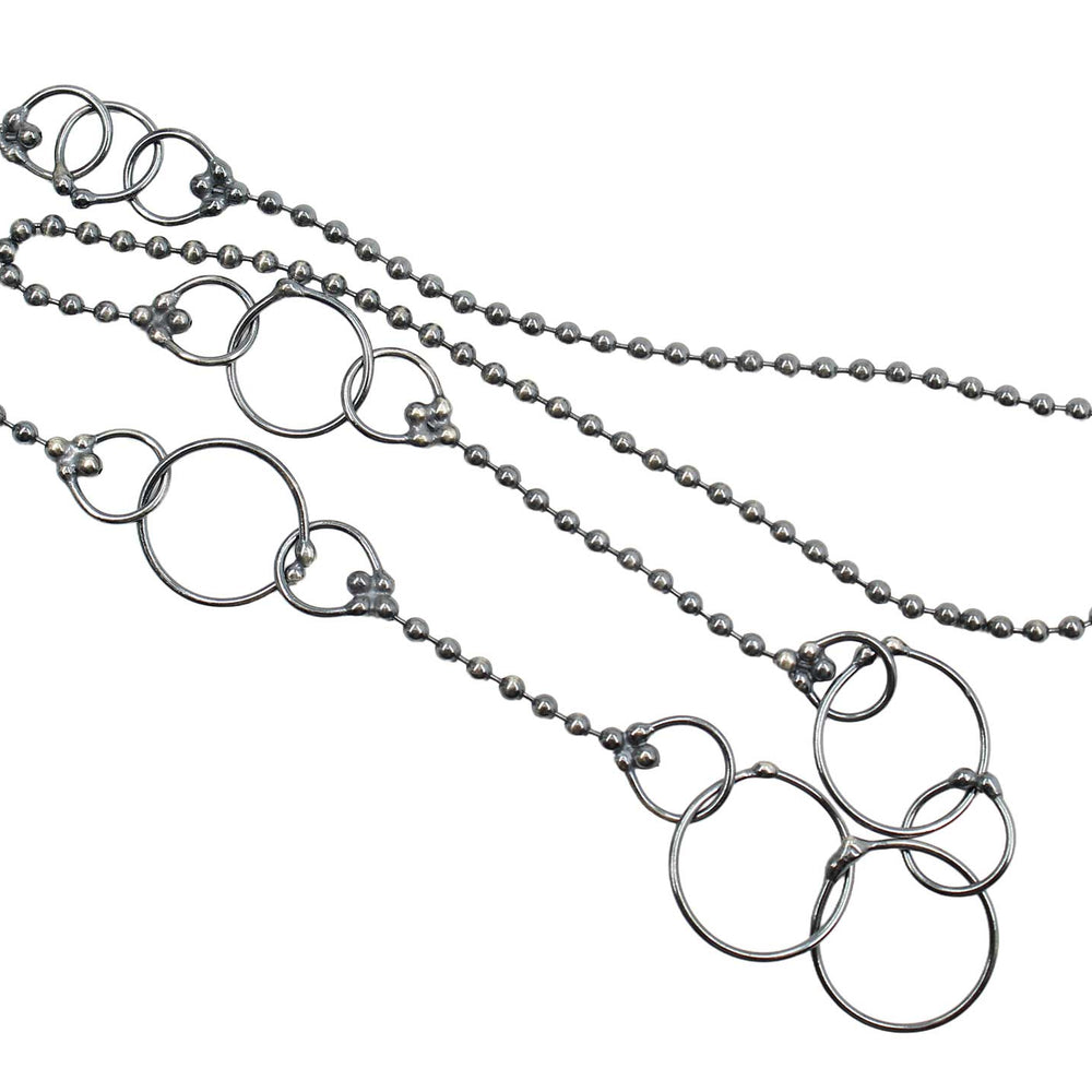 
                      
                        Silver necklace with circular links No Clasp
                      
                    