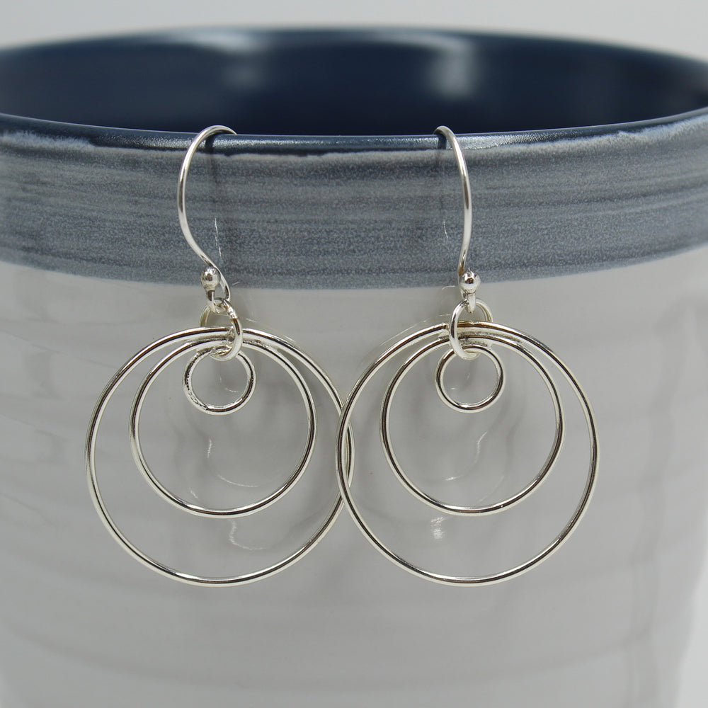 
                      
                        Sterling Silver Triple Hoop Dangle Earrings
                      
                    