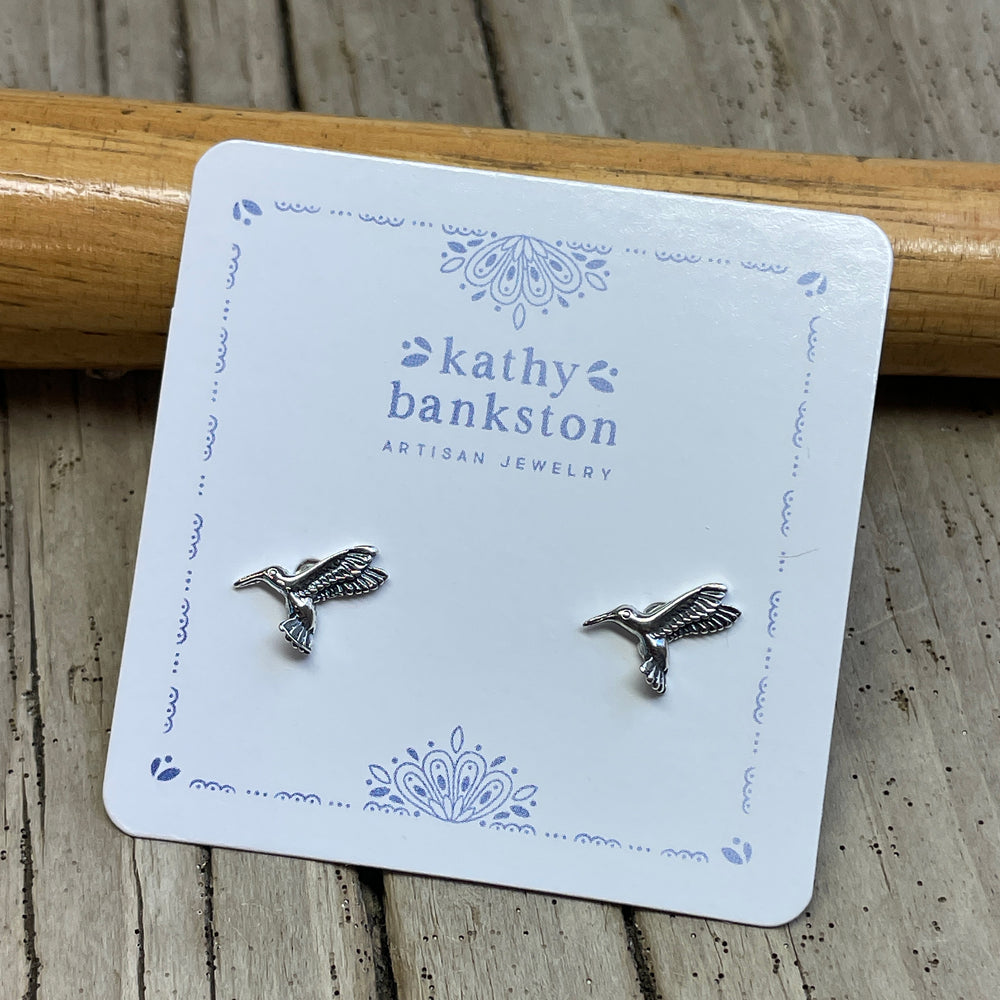 
                      
                        Tiny Sterling Silver Hummingbird Stud Earrings
                      
                    