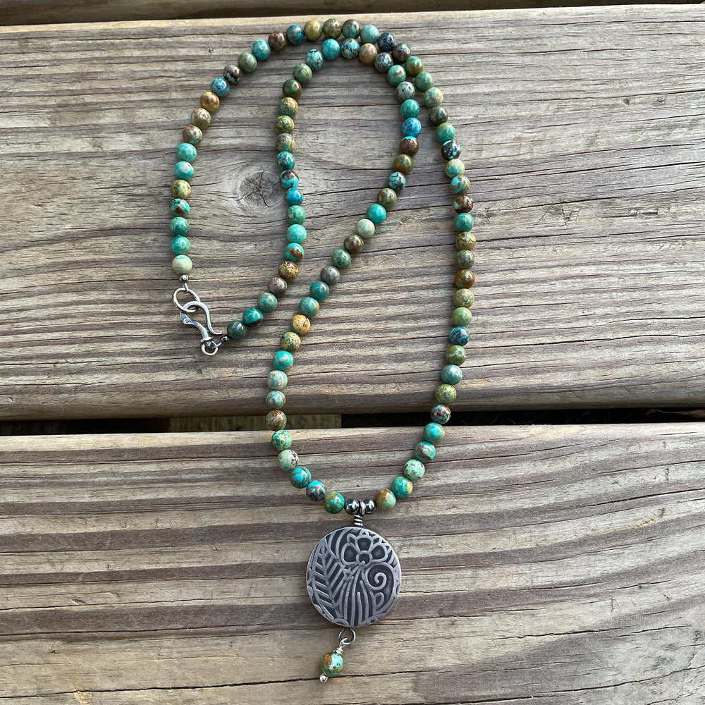 
                      
                        Green Turquoise Necklace with Sterling Silver Pendant
                      
                    