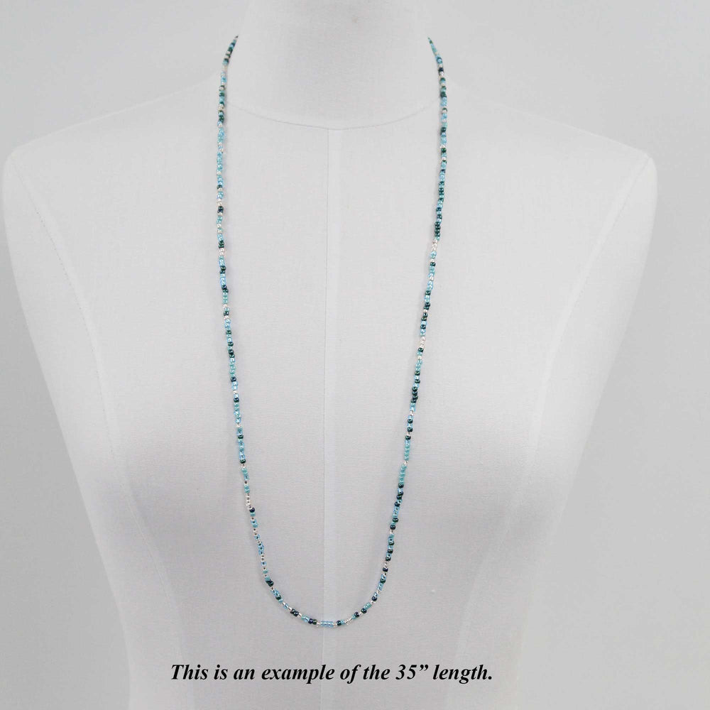 
                      
                        35" Blue Teal and Silver Seed Bead Necklace, Thin 2mm Single Strand

                      
                    