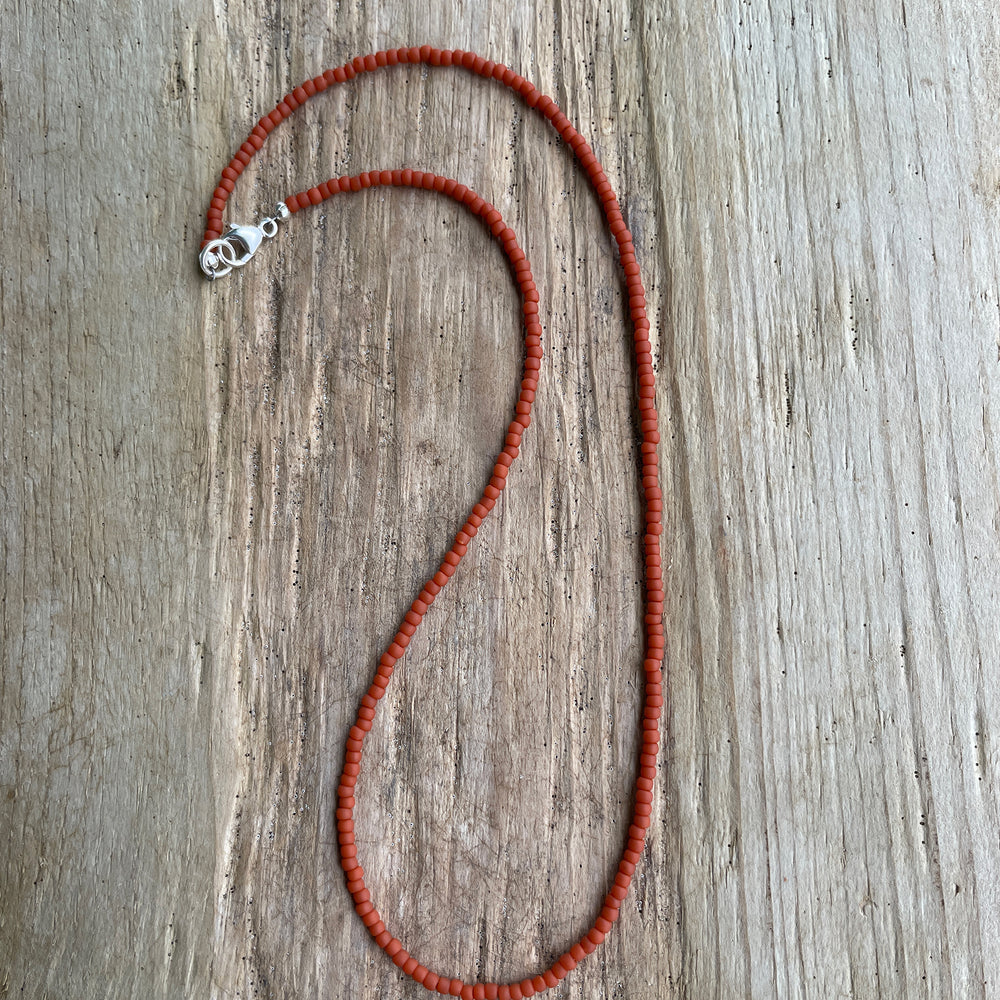 
                      
                        Terra Cotta Brown Seed Bead Necklace
                      
                    