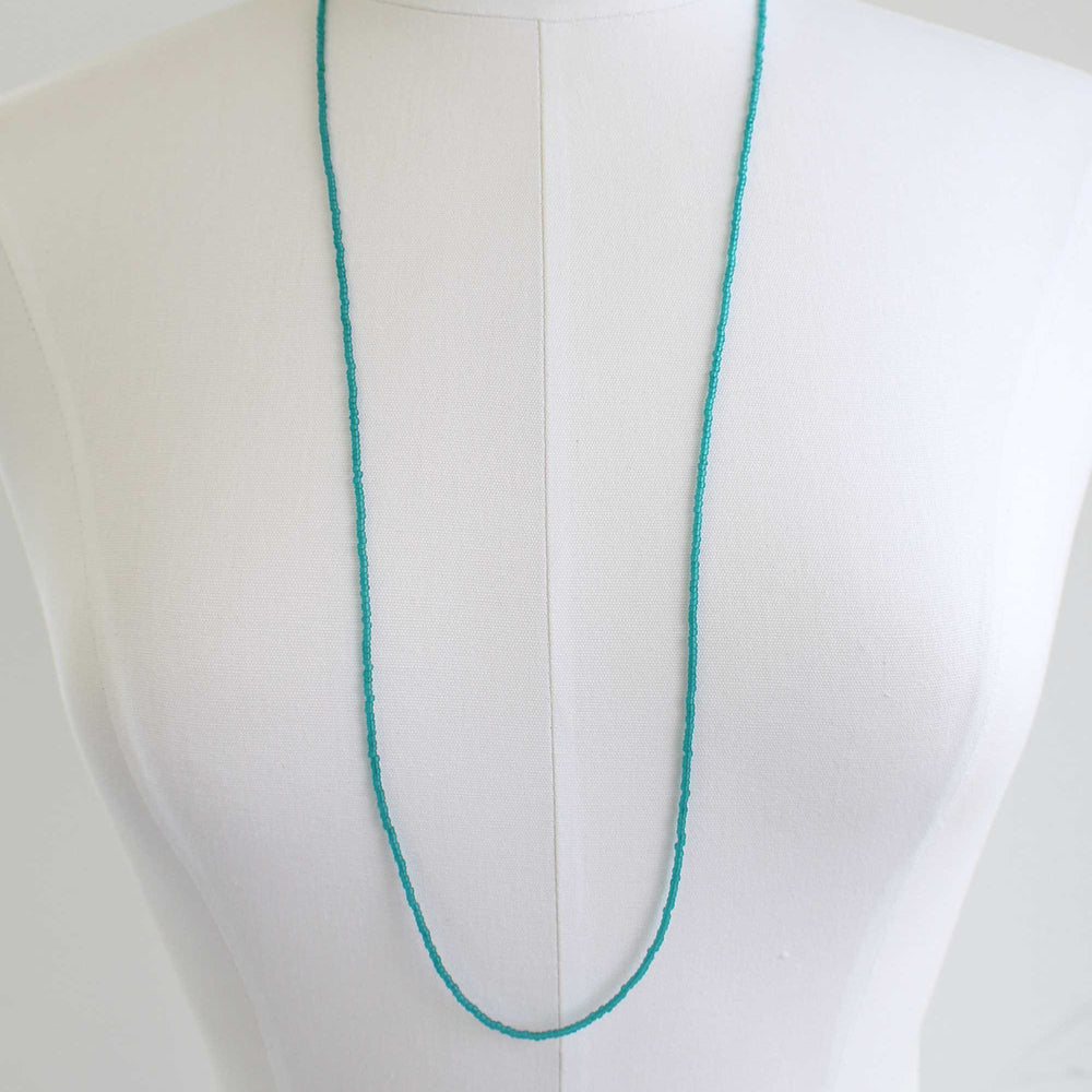 
                      
                        Long Teal Bead Necklace
                      
                    