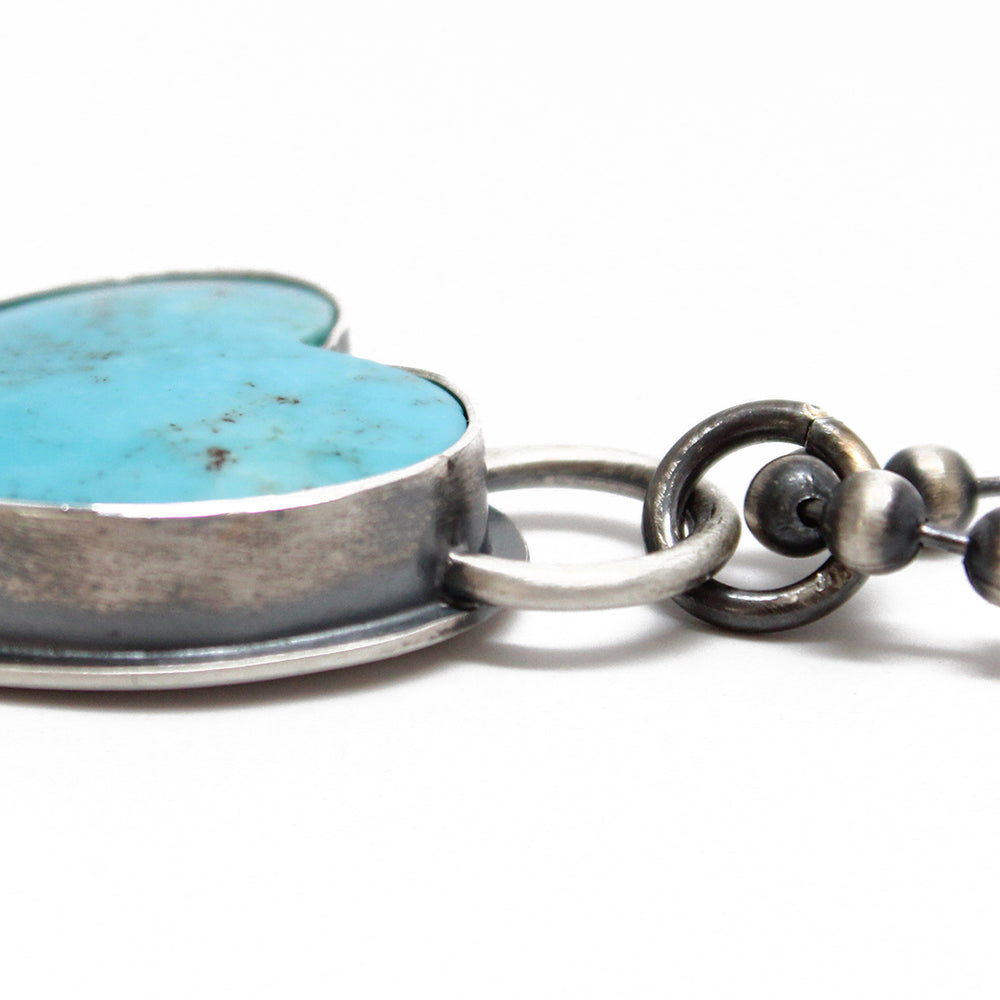 
                      
                        Southwestern Turquoise Heart Pendant
                      
                    