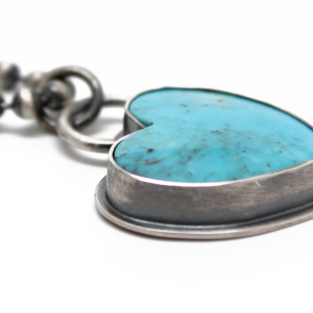 
                      
                        Southwestern Turquoise Heart Pendant
                      
                    