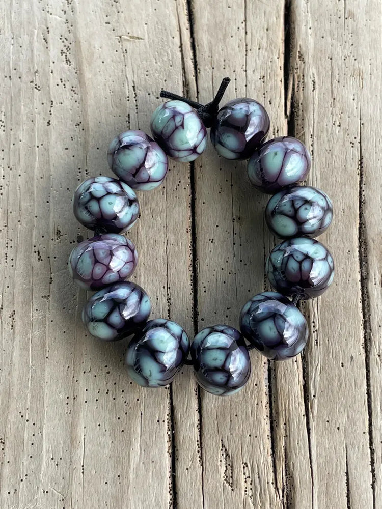 
                      
                        Turquoise and Plum Lampwork Beads

                      
                    