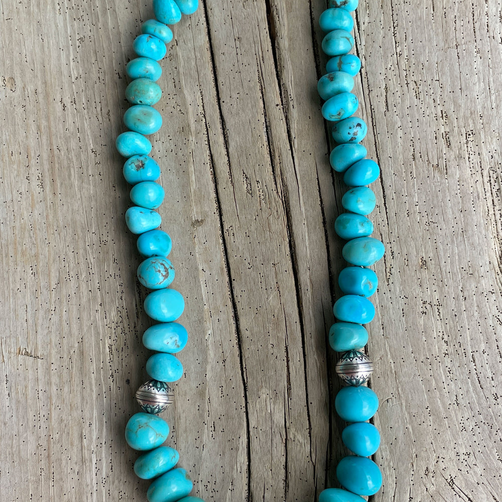 
                      
                        Genuine Blue Turquoise Pebble Bead Graduated Strand Necklace with Sterling Silver Accents 17 Inches
                      
                    