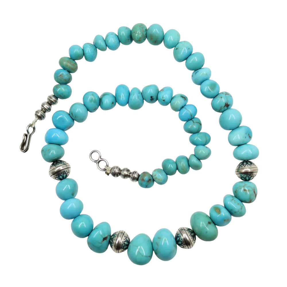 
                      
                        Turquoise beaded necklace with silver clasp 
                      
                    