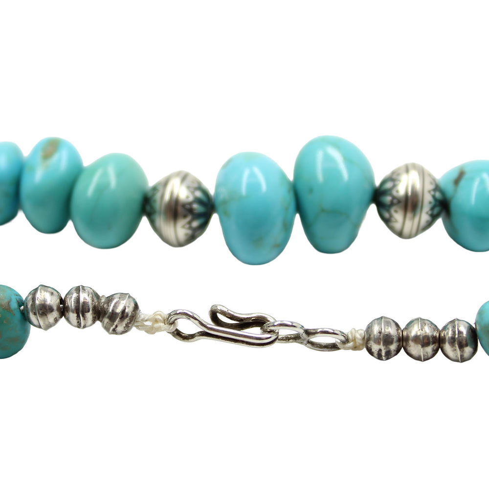 
                      
                        Turquoise beaded necklace with silver clasp 
                      
                    