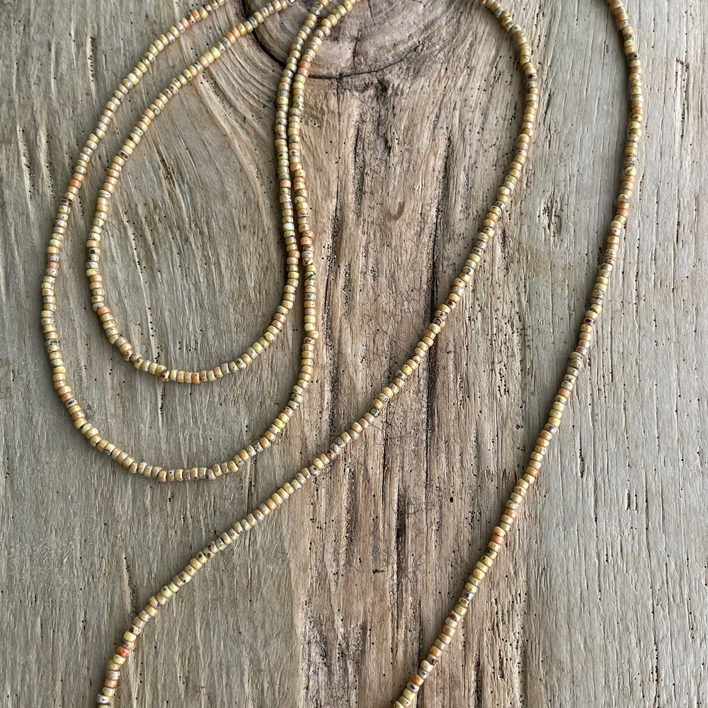 
                      
                        Tan Picasso Seed Bead Necklace
                      
                    