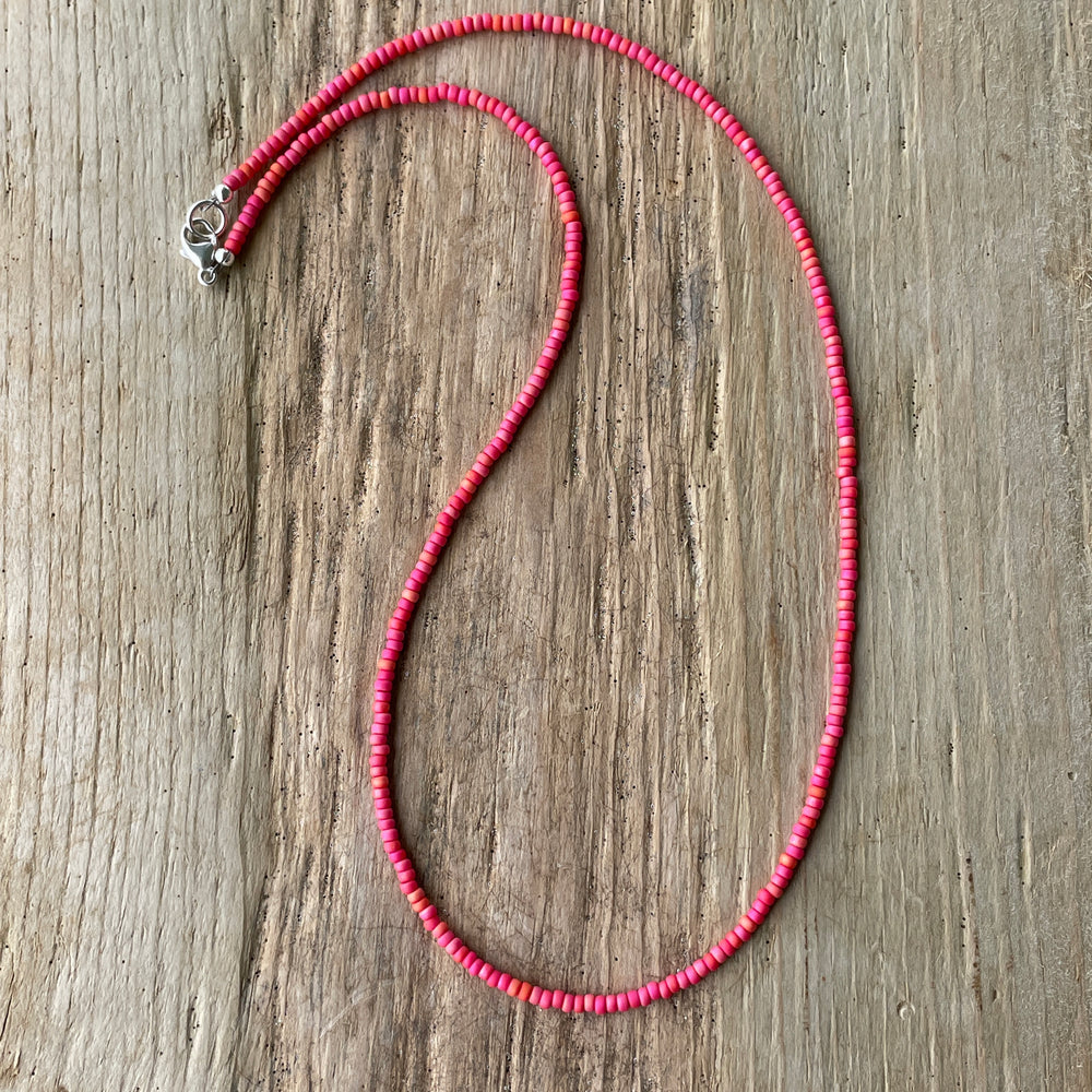 
                      
                        Coral Color Seed Bead Necklace
                      
                    