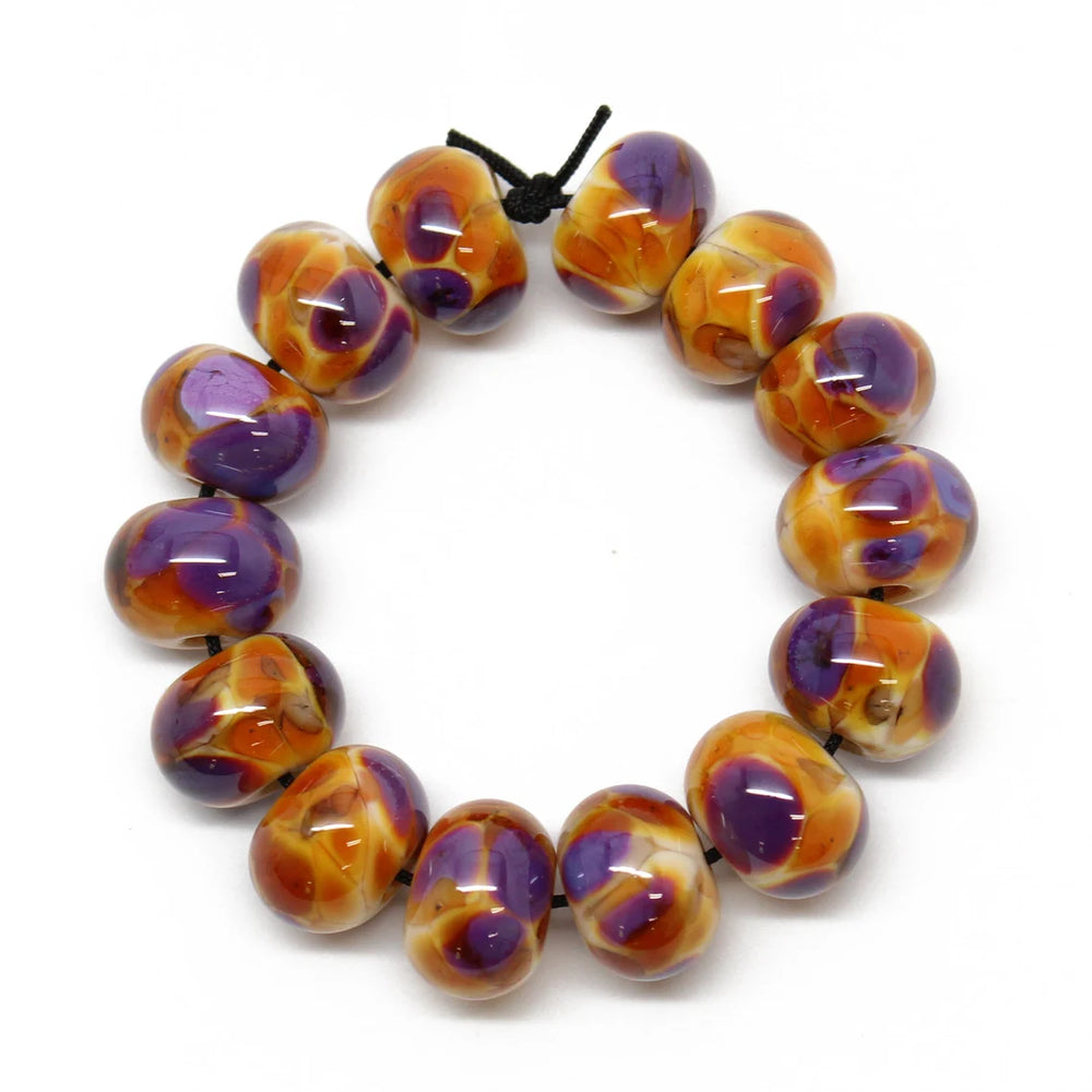 
                      
                        Purple and Gold Lampwork Beads
                      
                    