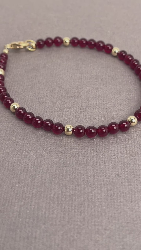 Load and play video in Gallery viewer, Red Jade and Gold Filled Bead Bracelet
