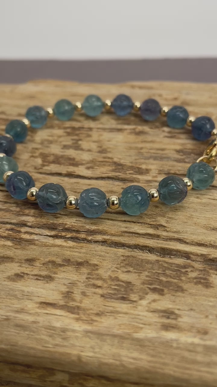 Load and play video in Gallery viewer, Hand Carved Fluorite and Gold Bead Bracelet

