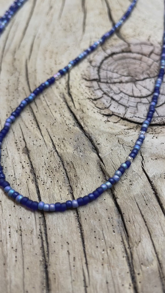 Load and play video in Gallery viewer, Multi Color Blue Seed Bead Necklace, Thin 1.5mm Single Strand
