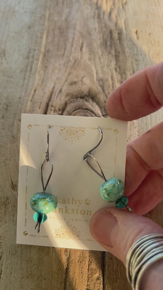 Load and play video in Gallery viewer, Turquoise Blue Green Lampwork Bead Dangle Earrings in Sterling Silver
