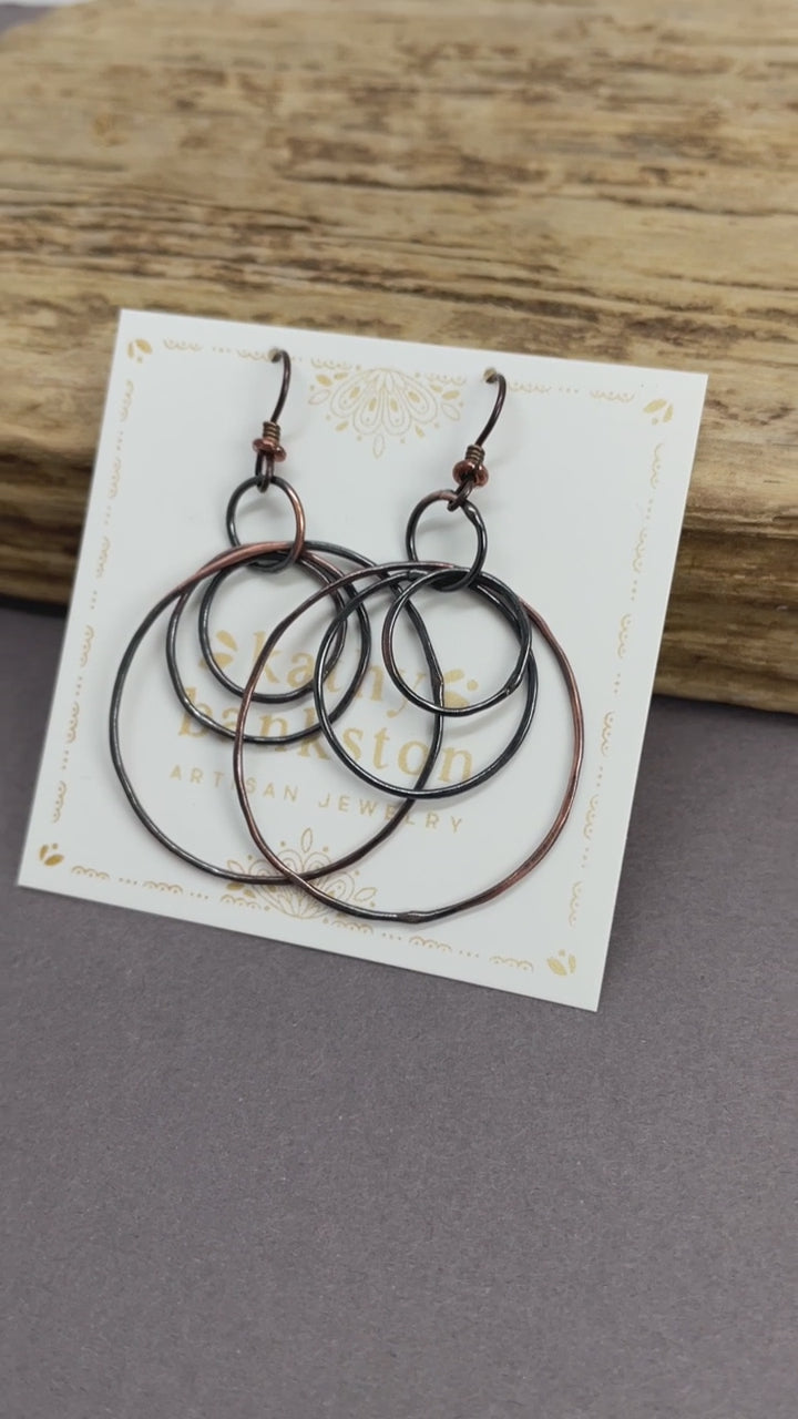 Load and play video in Gallery viewer, Handmade Concentric Copper Hoop Earrings
