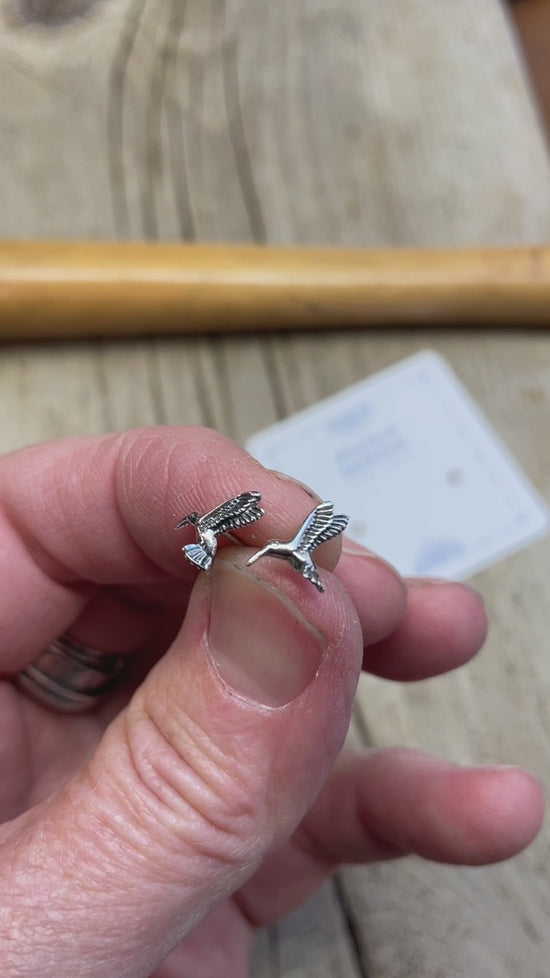 Load and play video in Gallery viewer, Tiny Sterling Silver Hummingbird Stud Earrings

