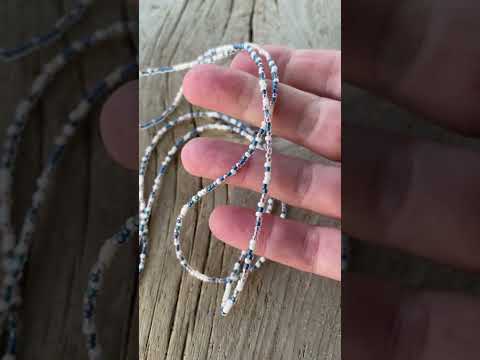 
                      
                        Load and play video in Gallery viewer, Blue and White Pearl Color Seed Bead Necklace
                      
                    