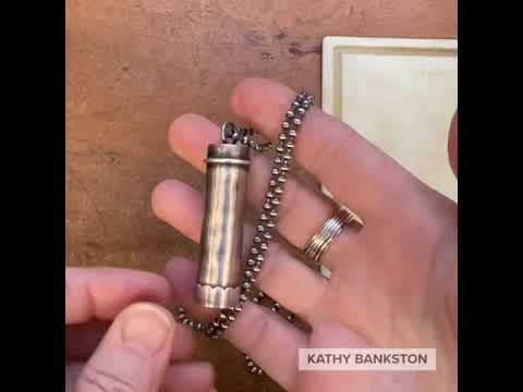 Handcrafted sterling silver container pendant