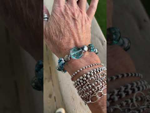 
                      
                        Load and play video in Gallery viewer, Blue Lampwork Bracelet with Sterling Silver Shells
                      
                    