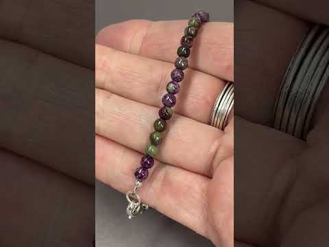 Load and play video in Gallery viewer, Atlantisite Stichtite Bead Bracelet with Clasp
